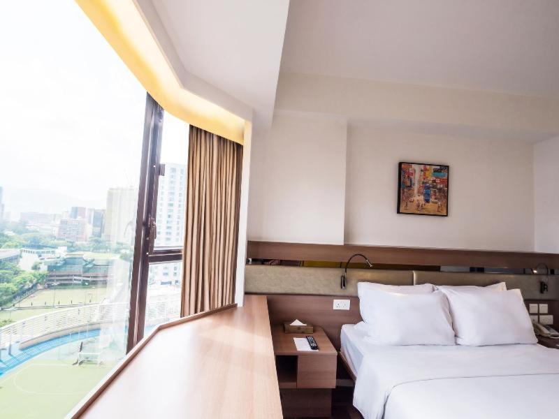 Travelodge Kowloon Hongkong Zimmer foto